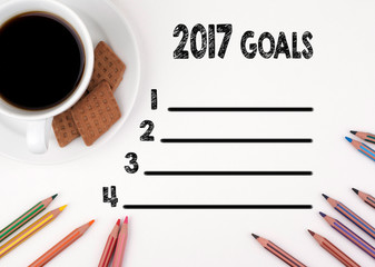 Wall Mural - 2017 goals list. White desk with a pencil and a cup of coffee.