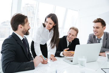 Wall Mural - Business team talking by the table