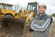 © auremar - backhoe operator posing
