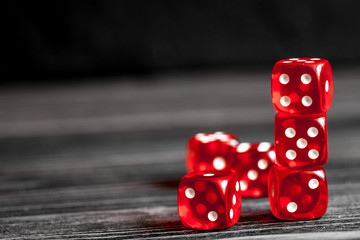 concept luck - dice gambling on dark wooden background