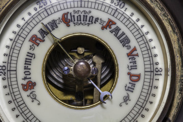 rain and wet weather warning. vintage barometer forecasts rain.
