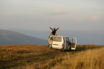 Wall Mural - Young people travel by minibus