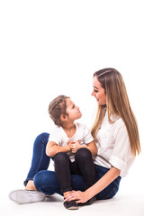 Happy family on white background. Mother and  small daughter