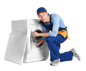 Wall Mural - Plumber with washing machine on white background