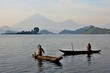 Fishermen and workers in african congo, wild and nature in africa, beautiful landscape view, green jungle and mountains