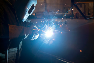 Wall Mural - Repair of parts of the apparatus for manual arc welding