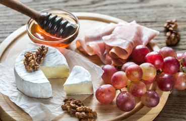 Sticker - Camembert cheese with nuts and prosciutto