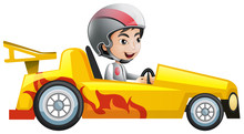 Boy In Yellow Racing Car
