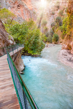 Mountain stream full of smooth rocks in Saklikent Gorge Canyon in Turkey