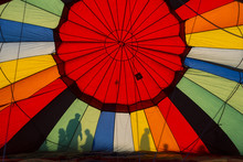 Inside Hot Air Balloon With Shadows Of People On Canopy.
