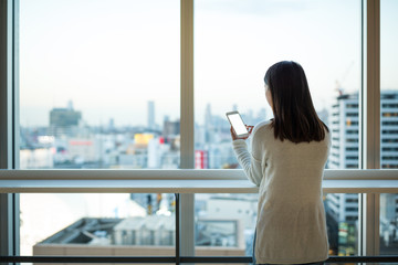 Sticker - Woman use of cellphone inside office