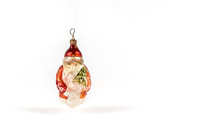 Antique Christmas Santa Claus Ornament On A White Background
