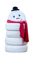 Snowman Made From Painted Tires Isolated On White Background.