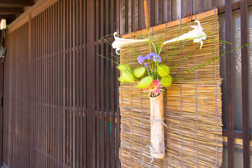 Wall Mural - The flower displayed in an old Japanese house