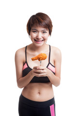 Wall Mural - Beautiful Asian healthy girl enjoy eating   fired chicken