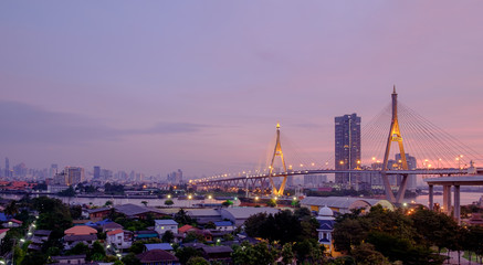 Wall Mural - Elevated expressway / View of elevated expressway cross the river and city at twilight.