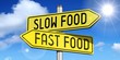 © PX Media - Slow food, fast food - yellow road-sign
