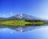 Fototapeta Na ścianę - Reflection Beautiful View of Mount Kinabalu During Blue Sky.