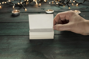 Wall Mural - Hand holding business card, blank for copyspace