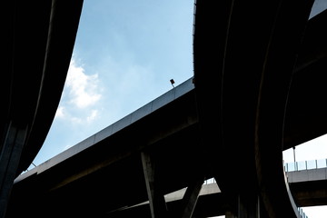 Wall Mural - Silhouette of highway ramps on a sunny day