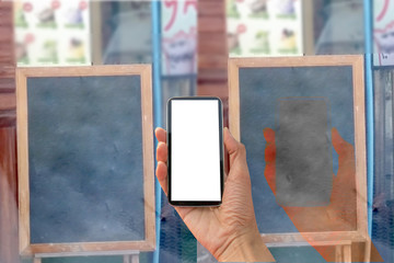 Hand holding smartphone