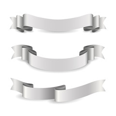 Wall Mural - Set of shiny silver ribbons. Vector realistic elements for your design gift card or invitation for holidays. Isolated from the background.