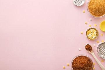 Dessert ingredients and utensils with pink copy space. Top view