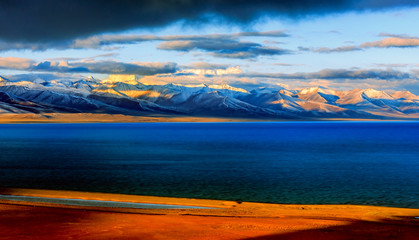 Snow covered mountain and Nam lake at sunrise, Tibet, China