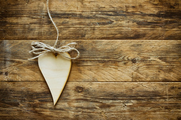 Wall Mural - Valentine's day plywood heart hangind on rope