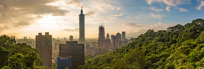 ​
Cityscape nightlife view of Taipei. Taiwan city skyline at twilight time,  The seaside mountain town scenery in Jiufen, with Taipei 101 Tower in Xinyi Commercial District 