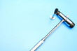 © sandro_23 - Medical background with a neurological hammer