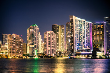 Wall Mural - Beautiful Miami Florida skyline with lights and bay at night