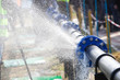 © pipicato - Burst pipe with water