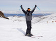happy man happy in snow mountains at Sierrna Nevada ski resort in Spain