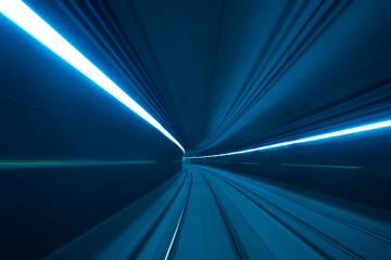 Speed motion blurred underground subway tunnel