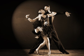 dancers in ballroom isolated on black background