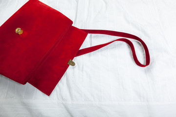 Female bag on white textile