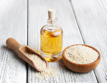 Sesame Seeds And Bottle With Oil
