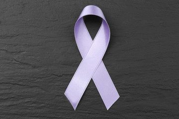 Poster - Lavender ribbon on dark textured background. Cancer and epilepsy concept