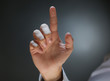 © Africa Studio - Businessman hand pointing, dark background