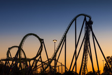 Roller Coaster Silhouette At Sunset