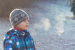 Child on frosty morning in park