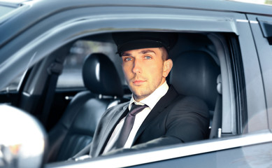 Canvas Print - Chauffeur driving a car, closeup