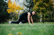 © photominus21 - Fitness man training and jogging in fall park. Ready to start. Healthy lifestyle
