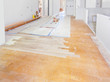 © Jo Ann Snover - Patching hardwood floor - inserting new wood into floor areas exposed by the remodel
