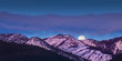 Moon rise over mountains with alpen glow pink light