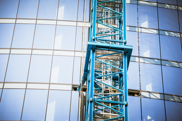 Wall Mural - Building construction near skyscraper