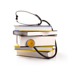 Medical Education - Stack Of Books With Stethoscope On White