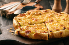 Homemade Quiche With Leek, Ham And Cheese On Wooden Background.