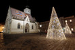 Saint Marks square and st. Mark church with Christmas tree made of lights in front of it as part of Advent in Zagreb, Croatia